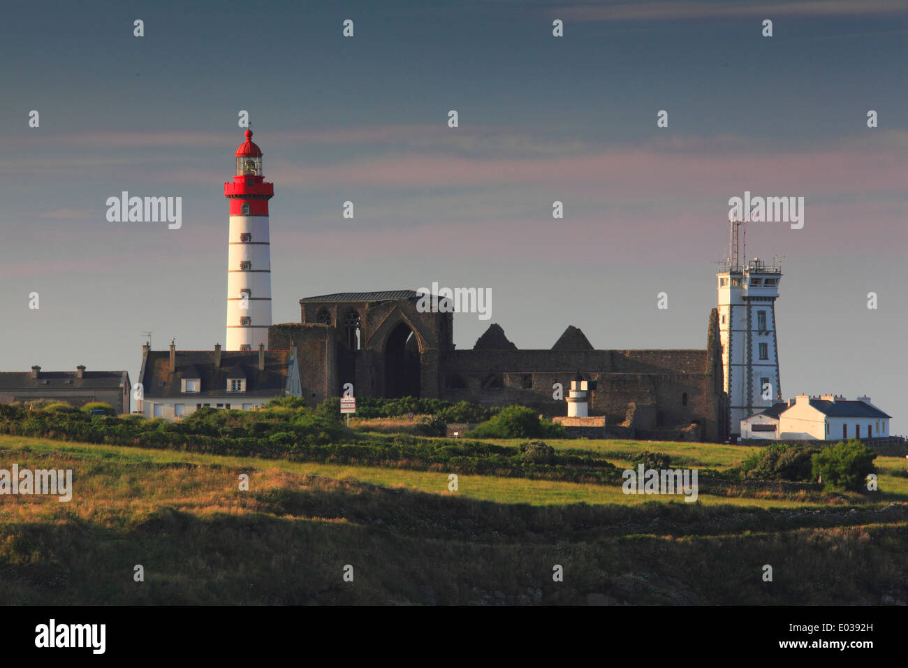 Photo of Saint Mathieu Lighthouse,Phare de Saint-Mathieu, Pointe Saint-Mathieu, and L'Abbaye Saint-Mathieu de Fine-Terre, France Stock Photo