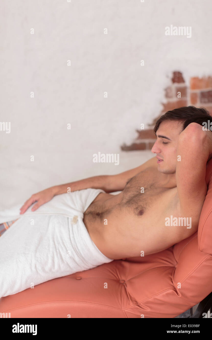 Young man relaxing in the salt room Stock Photo