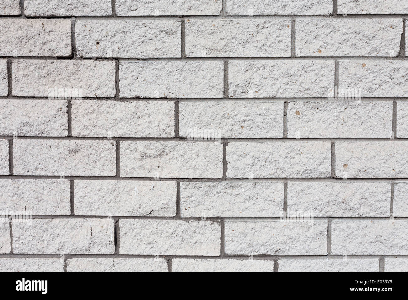 White grunge brick wall as a texture background Stock Photo - Alamy