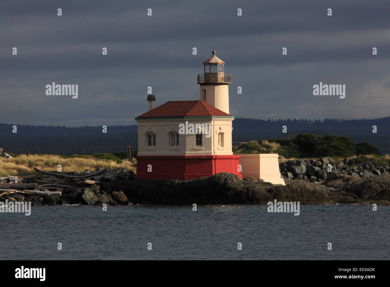 Photo of the Coquille River Lighthouse with stormy skies, Oregon coast, USA Stock Photo