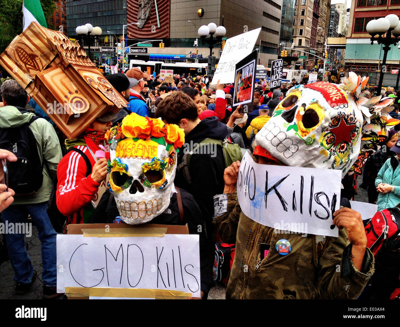 New York City Demonstration against GMO foods, Day of the Dead masks, GMO KIlls Stock Photo