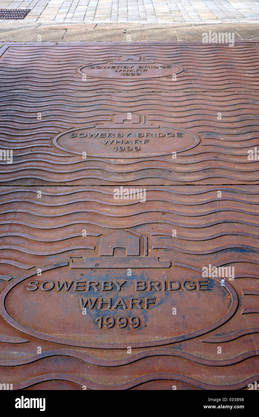 Large metal cellar covers at Sowerby Bridge Wharf, West Yorkshire Stock Photo