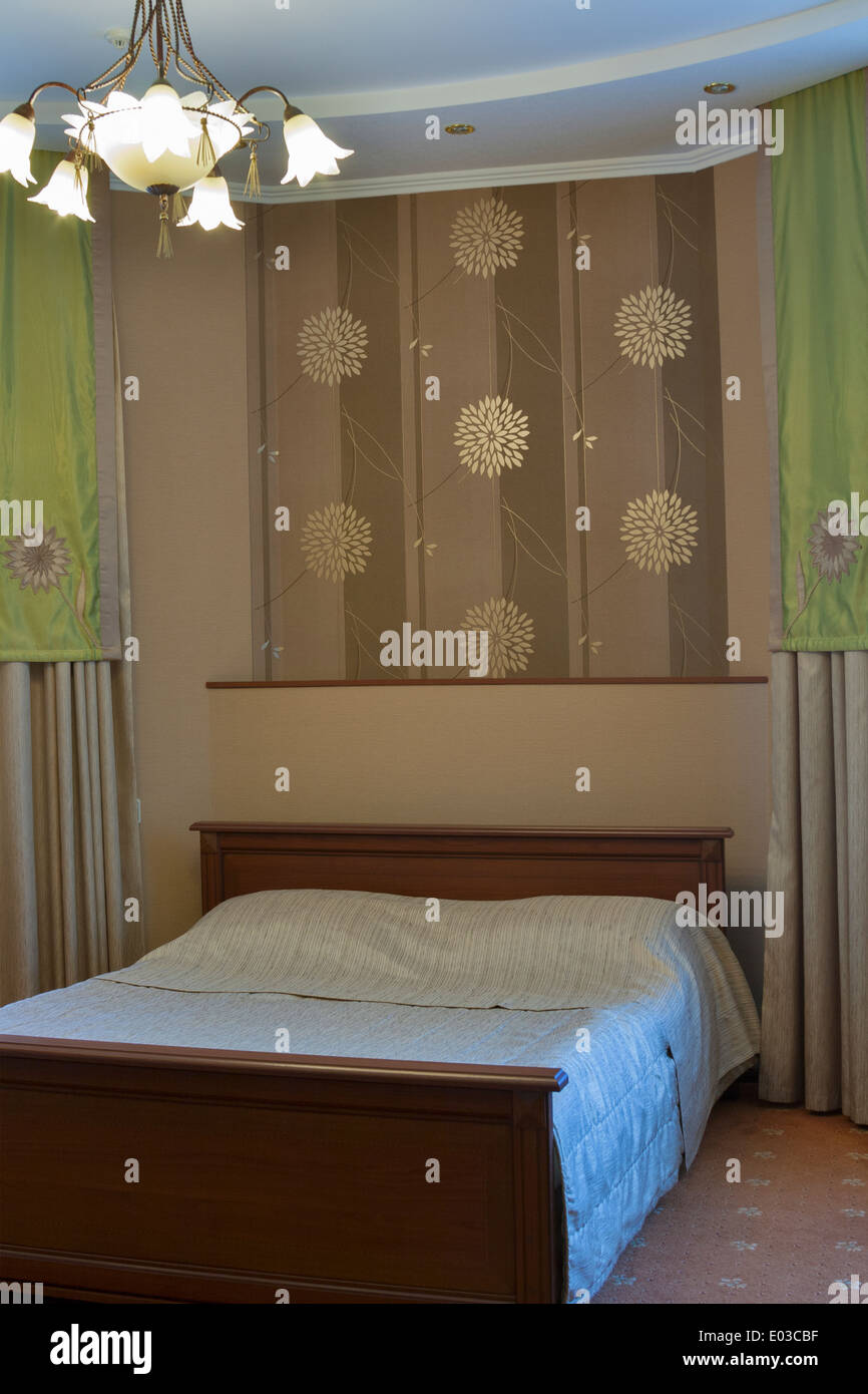 sleeping room with double bed illuminated Stock Photo