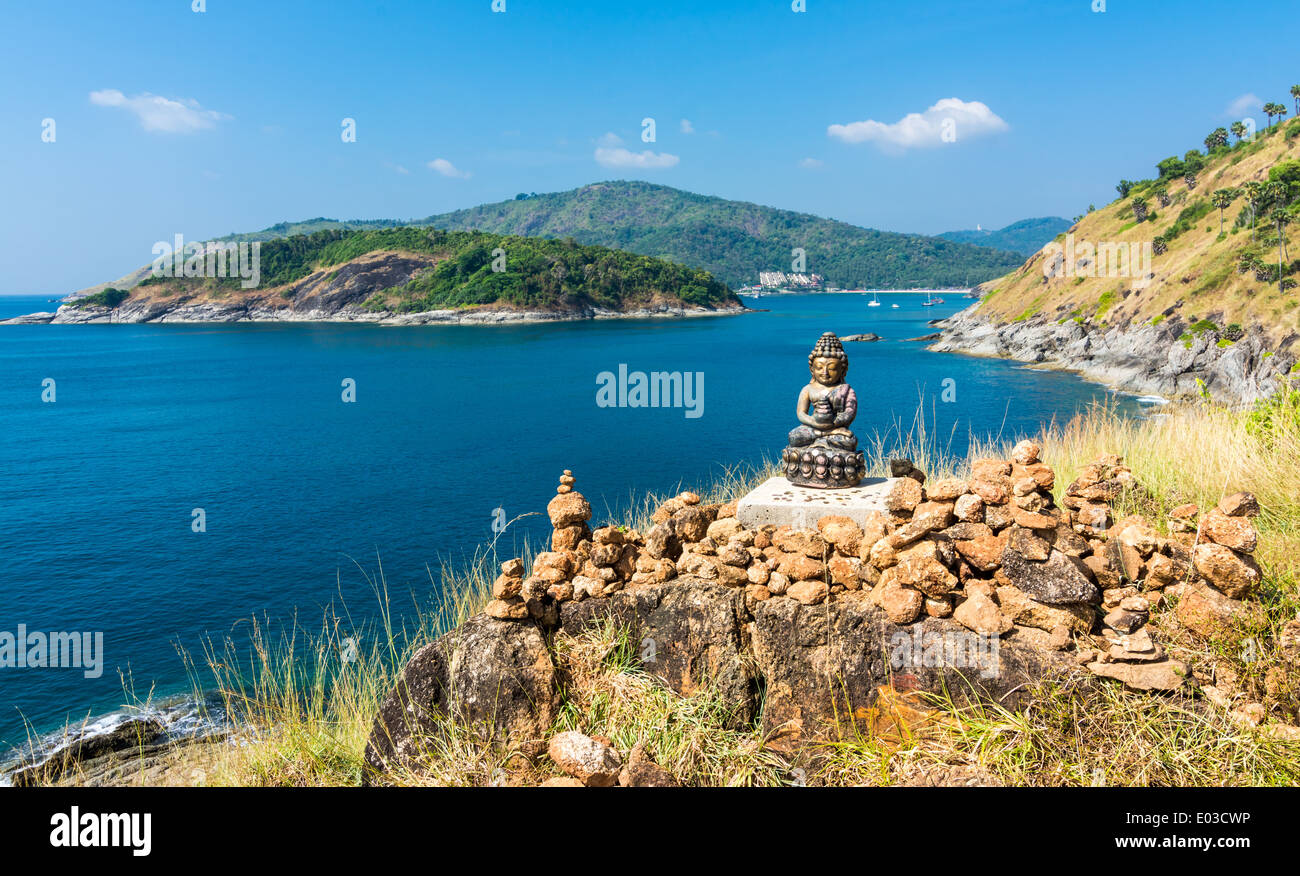 Phromthep cape viewpoint with a budha statue over the blue sky Phuket,Thailand Stock Photo