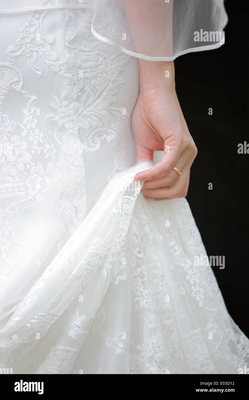 Close-up of a bride in a white dress Stock Photo