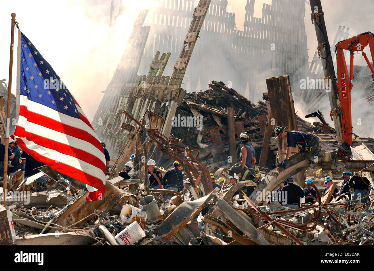 Rescue workers continue the recovery of victims amongst the wreckage of the World Trade Center in the aftermath of a massive terrorist attack which destroyed the twin towers killing 2,606 people September 16, 2001 in New York, NY. Stock Photo