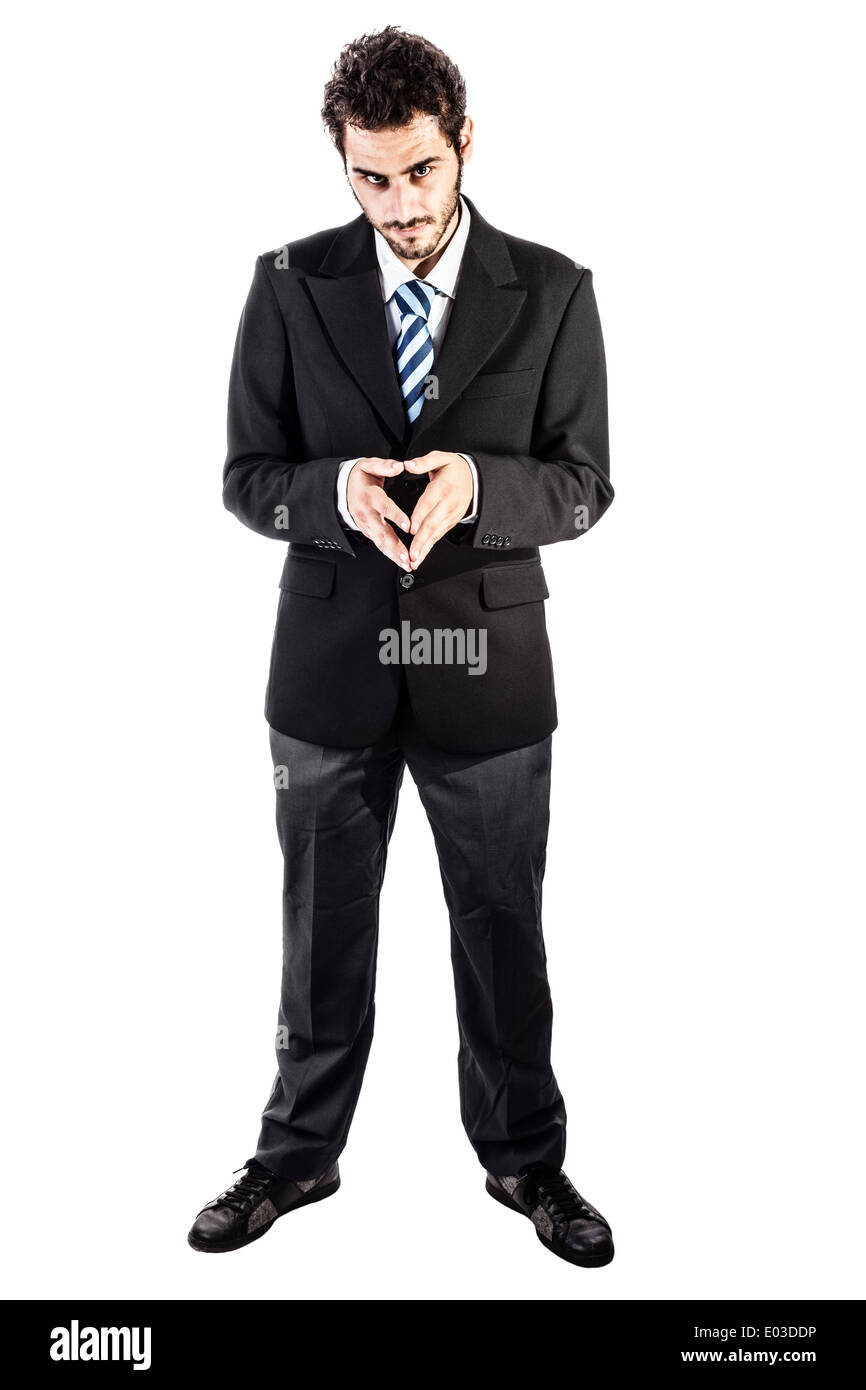 A Young And Handsome Businessman In An Evil Pose Isolated Over A White 