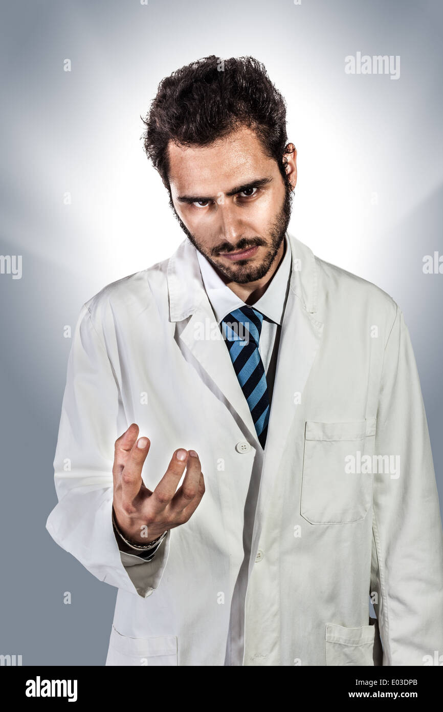 a young and handsome megalomaniac doctor or medical student Stock Photo