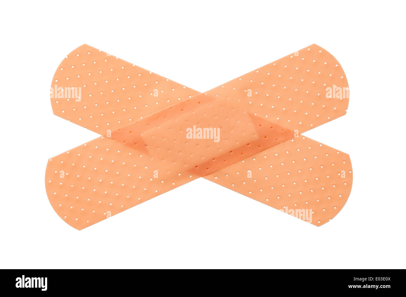 Bandages criss crossing isolated on a white background. Stock Photo