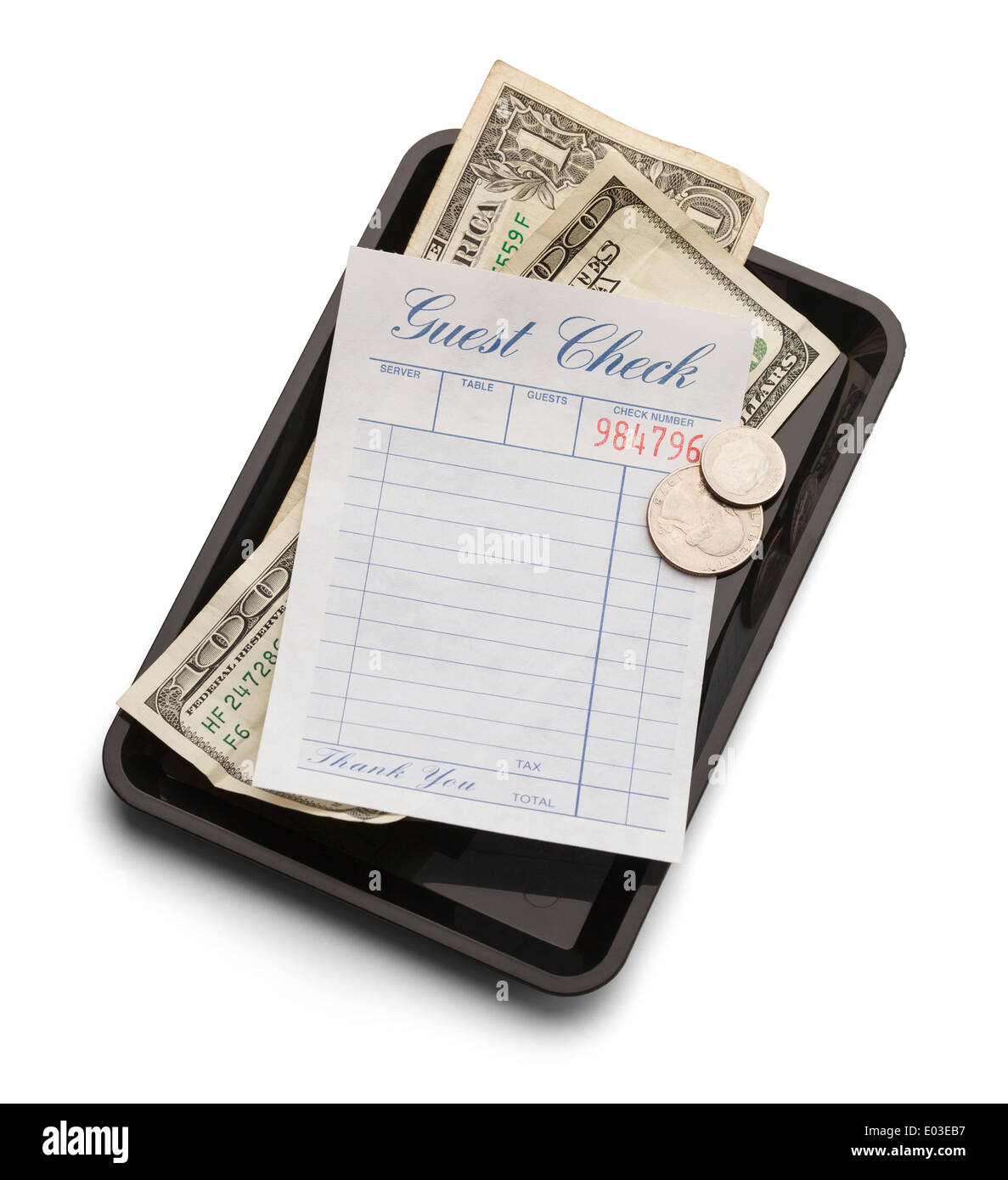 Restaurant bill with money on payment tray isolated on a white background. Stock Photo