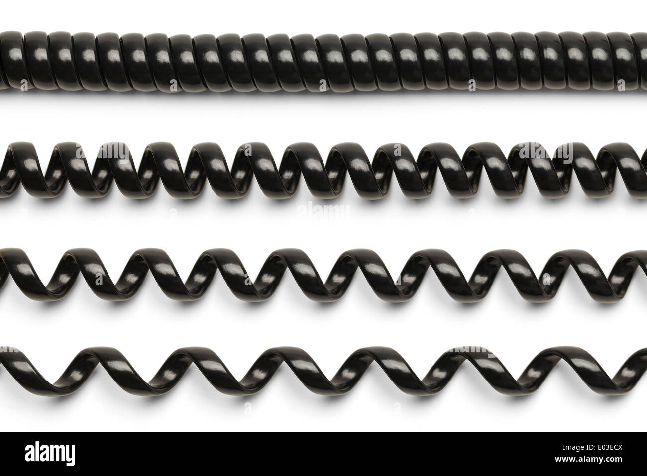 Phone Cord Segments that Range from Closed Up to Stretched Out. Stock Photo