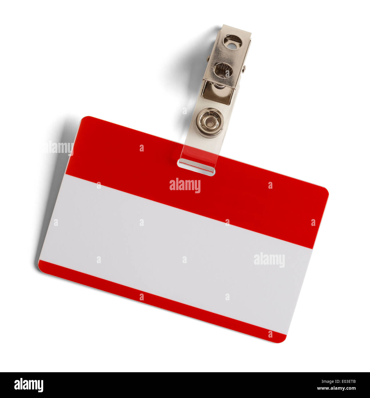 Red and White Plastic Name Badge with Metal Clip Isolated on White Background. Stock Photo