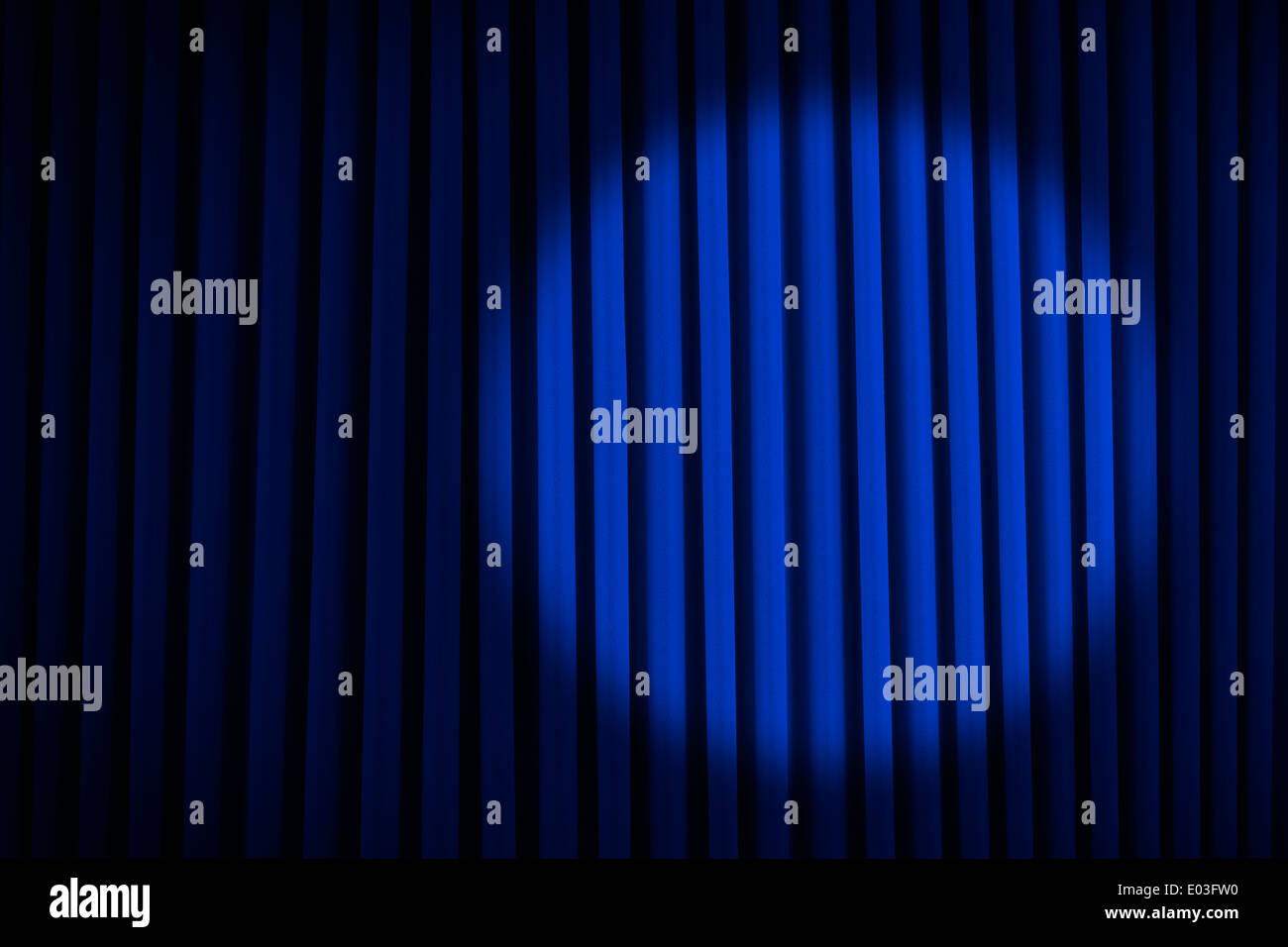 Blue Velvet Movie Curtains with Round Spotlight. Stock Photo