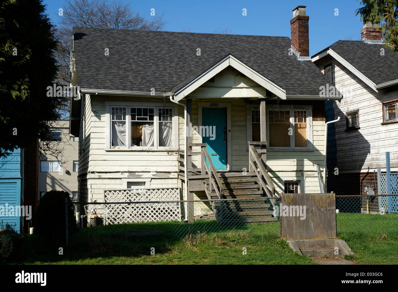 Boarded up old wooden house in Kitsilano Vancouver, BC, Canada Stock