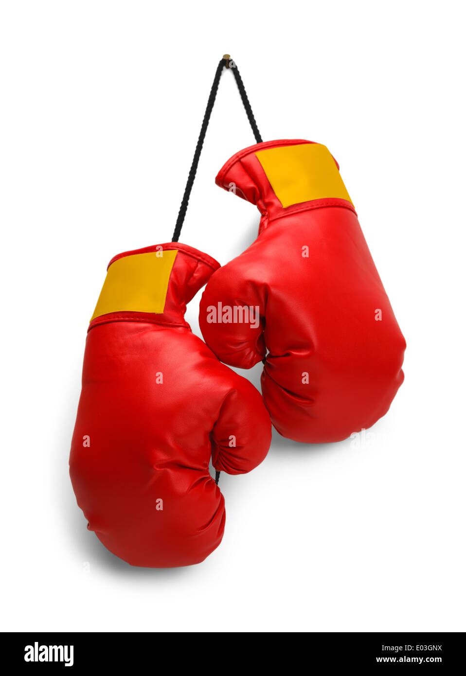 Pair of Red Boxing Gloves Hanging Isolated on White Background. Stock Photo