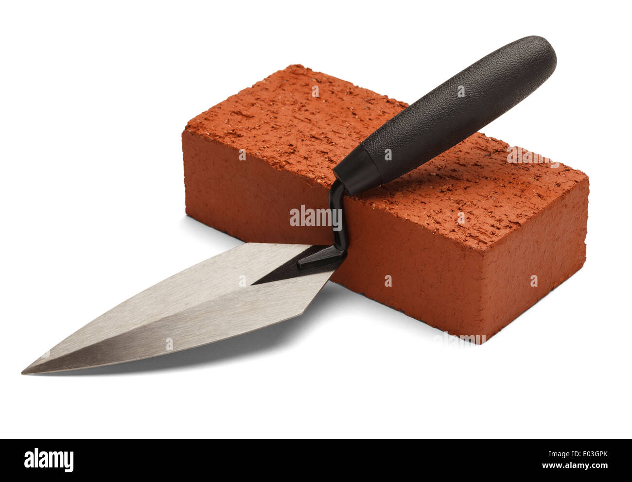 Single red brick with trowel isolated on white background. Stock Photo