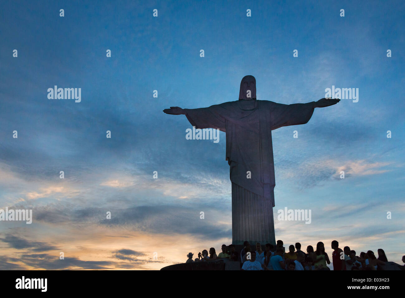 Tourists watching statue of Christ the Redeemer on Corcovado, Rio de Janeiro, Brazil Stock Photo