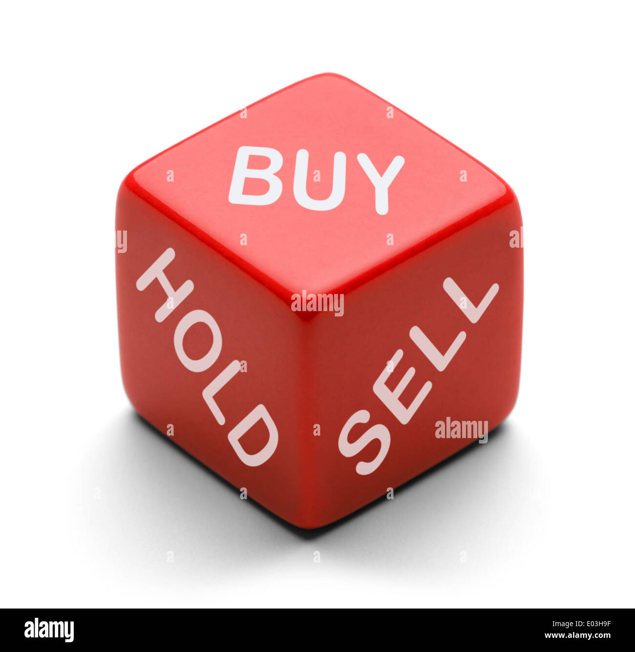 Red Dice with Buy Hold and Sell on it Isolated on White Background. For Stock Broker Decision Making. Stock Photo