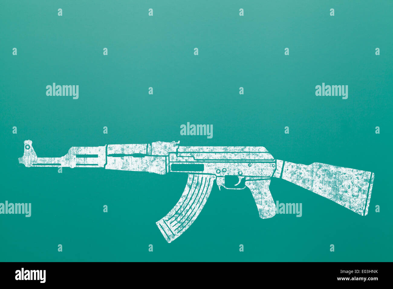 Ak 47 Machine Gun Assault Rifle Draw on Green Chalk Board. Stock Photo