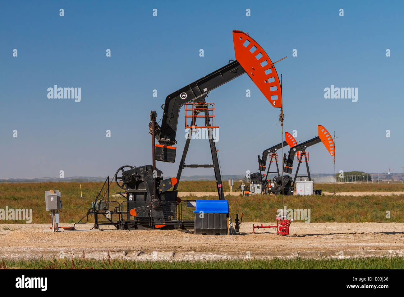 An oil production pump jack in the Bakken play oil field deposits near