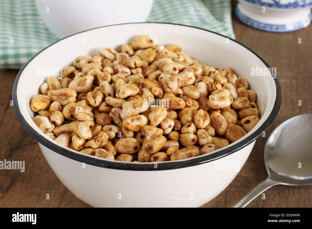 Honey coated puffed wheat breakfast cereal Stock Photo