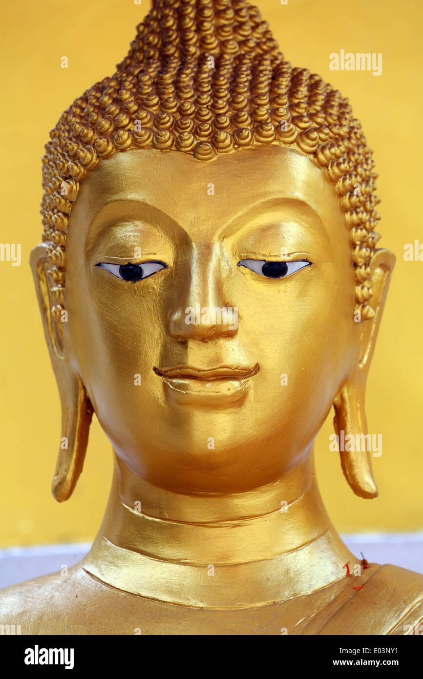 Gold Buddha statue head and face at Wat Panping Temple in Chiang Mai, Thailand  Stock Photo