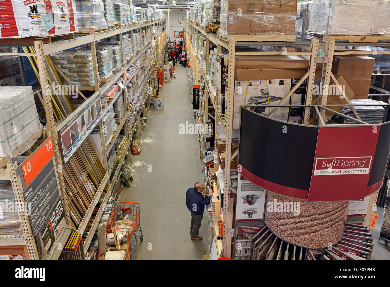 View down an aisle at Hone Depot store in Jericho, Long Island, New York Stock Photo