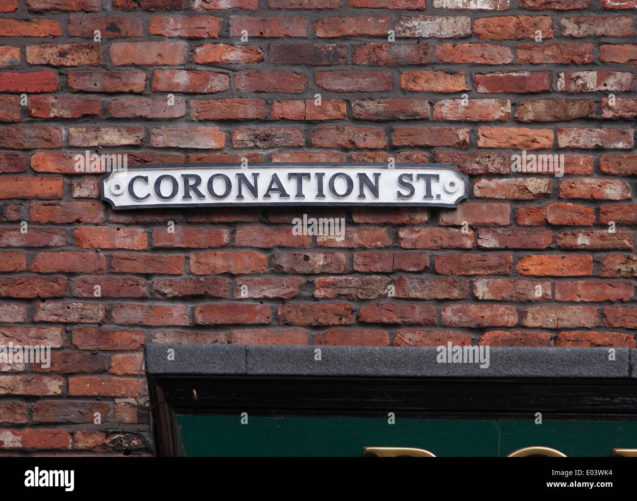 cast iron road name plate sign on the wall of the Rovers Return on set of Coronation Street,UK's longest running TV soap opera Stock Photo