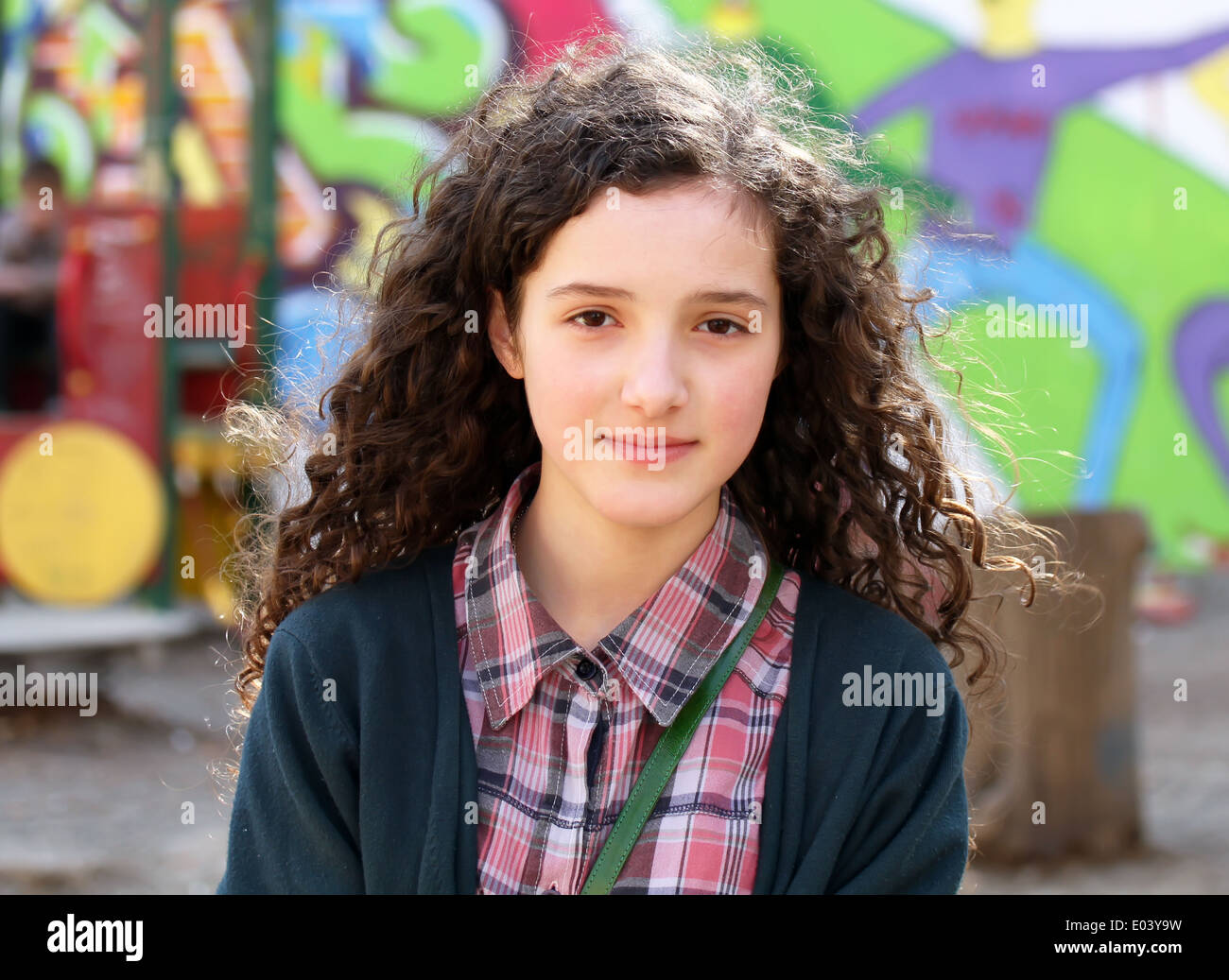 Portrait of beautiful young girl on the playground Stock Photo - Alamy