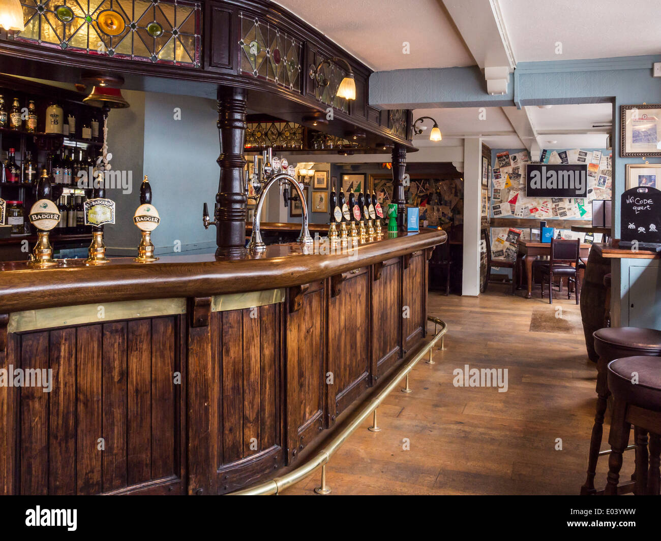 The Eel Pie pub interior with wooden bar, beer pumps and stained glass in  Church Street, Twickenham, Greater London, UK Stock Photo