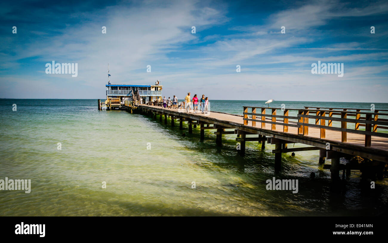 The Rod & Reel Pier on Anna Maria Island, FL, with bar and restaurant at the end of the dock with fishing pier, surrounded by the Gulf of Mexico Stock Photo