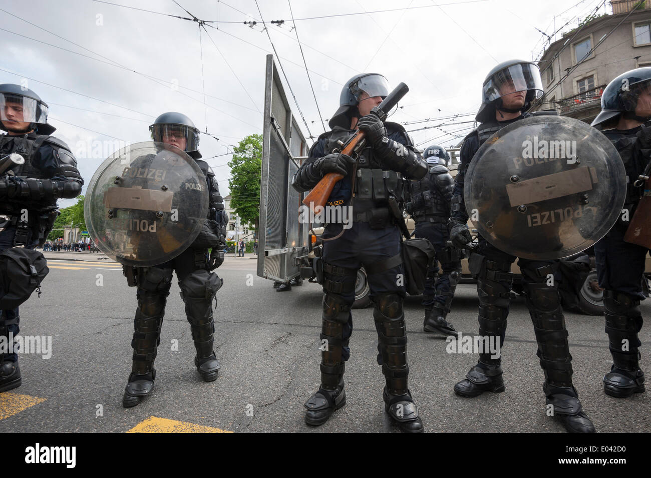 Zurich, Switzerland. 1st May, 2014. Armed police forces prepare to ...