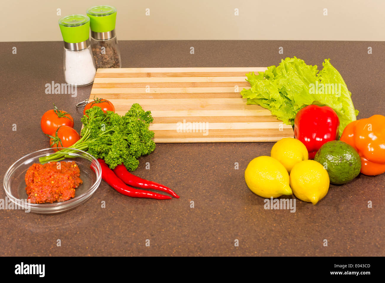 kitchen table with food and cutting board Stock Photo Alamy