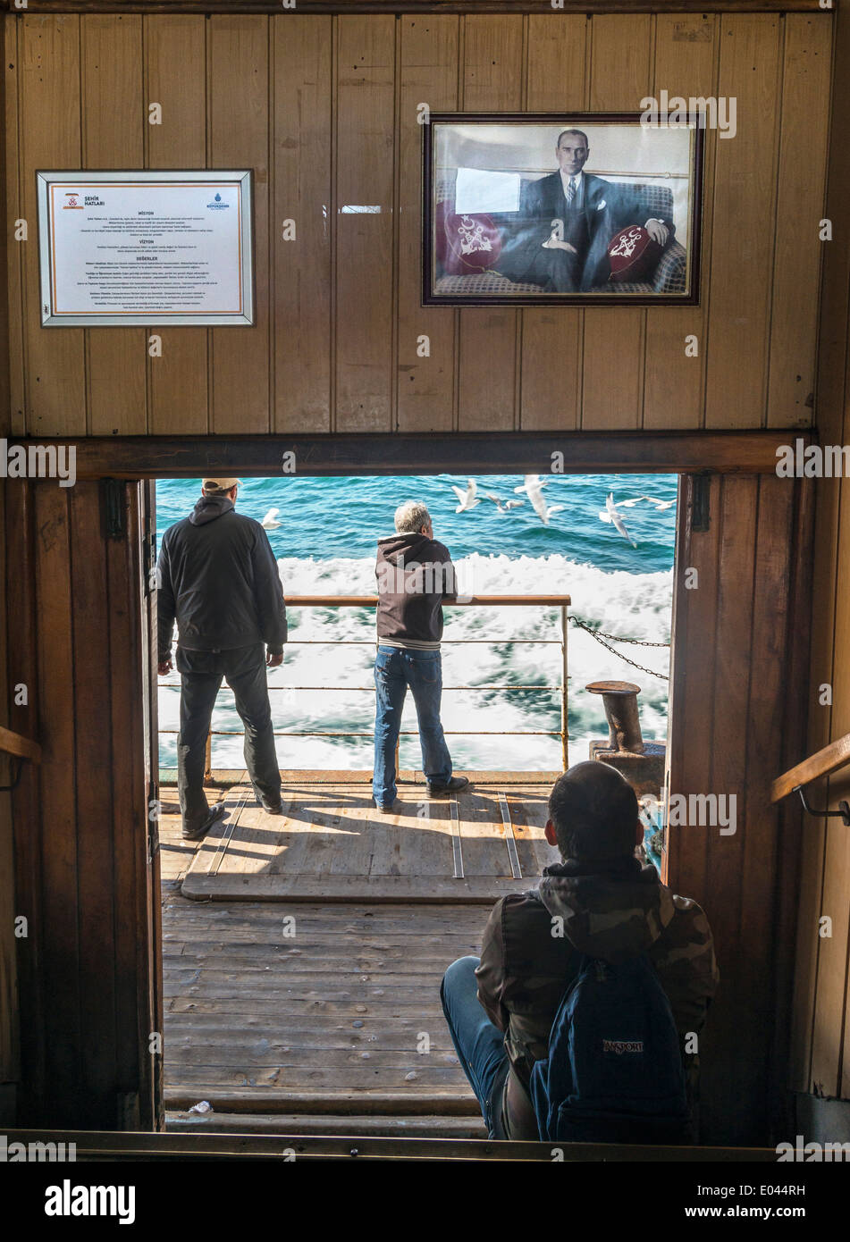 Mustafa Kemal Ataturk looks down on passengers on a ferry across the Bosphorus from Kadikoy to Eminonu, Istanbul, Turkey. Stock Photo