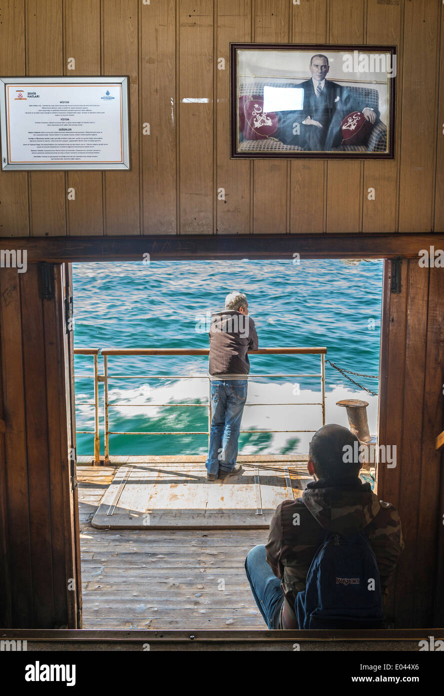 Mustafa Kemal Ataturk looks down on passengers on a ferry across the Bosphorus from Kadikoy to Eminonu, Istanbul, Turkey. Stock Photo