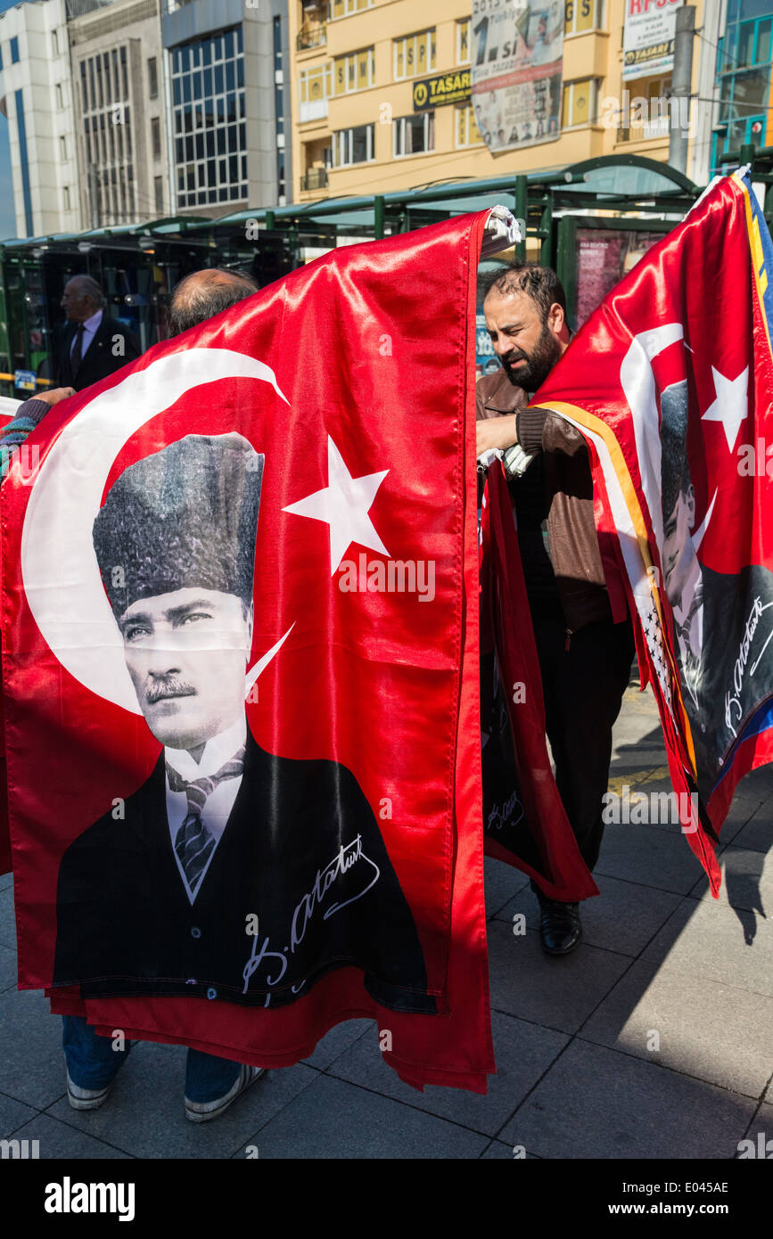 Flag sellers with turkish flags with portrait of Mustafa Kemal Ataturk, first president of Turkey, Kadikoy, Istanbul, Turkey. Stock Photo