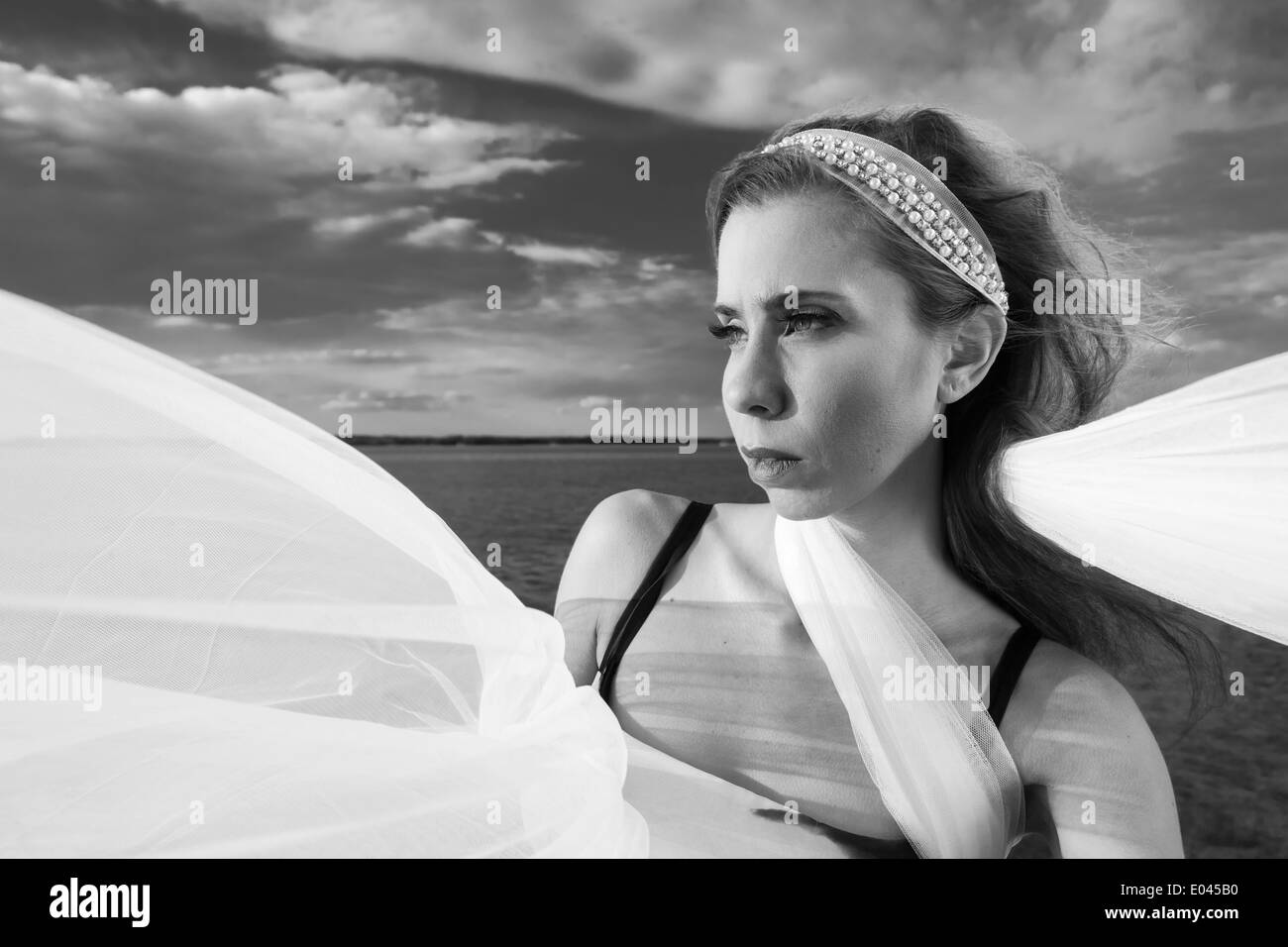 Young Lady with a white vail Stock Photo