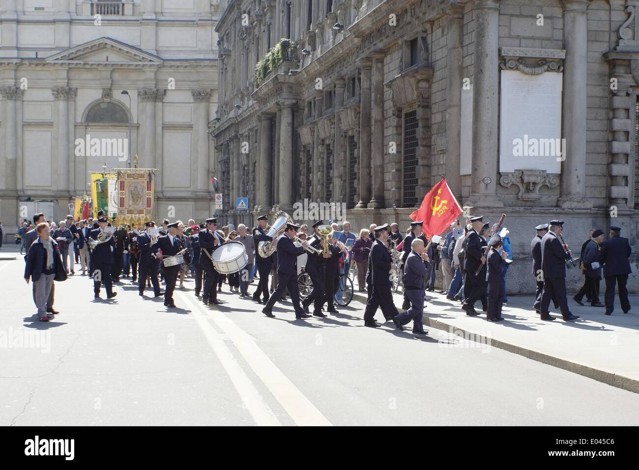 Milan, Italy. 1st May 2014.  Parade of confederated unions CGIL, CISL and UIL. Banner of Milan and town band 'Orchestra dei FIATI' at the head of procession. Credit:  Claudio Rancati / Alamy Live News Stock Photo