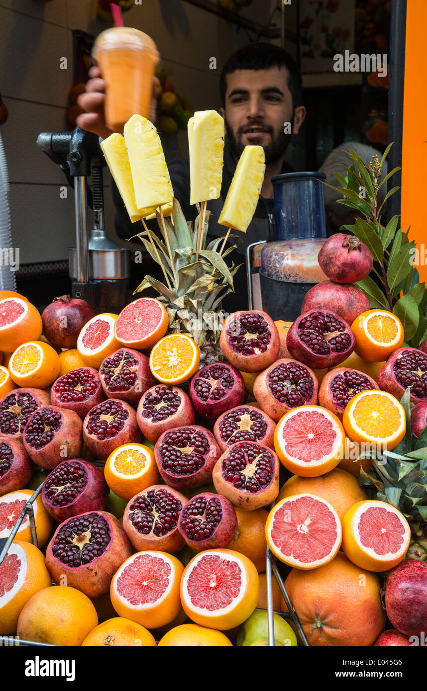 old metal fruit vegetable juice press squeeze machine street vendor with  fruit photographed in Istanbul Turkey Sultanahmet Stock Photo - Alamy