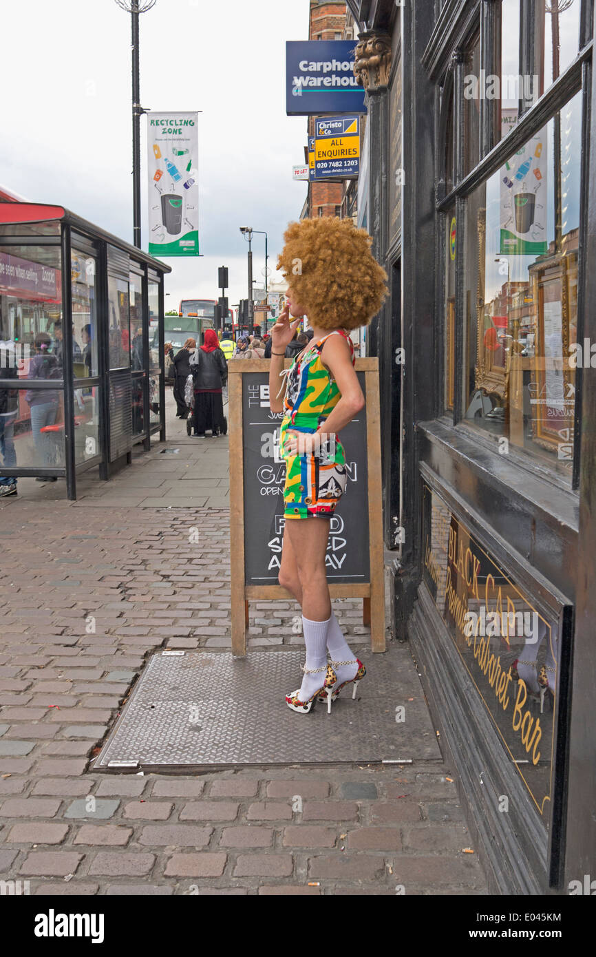 Man in drag outside the Black Cap pub in Camden Town, London. Stock Photo