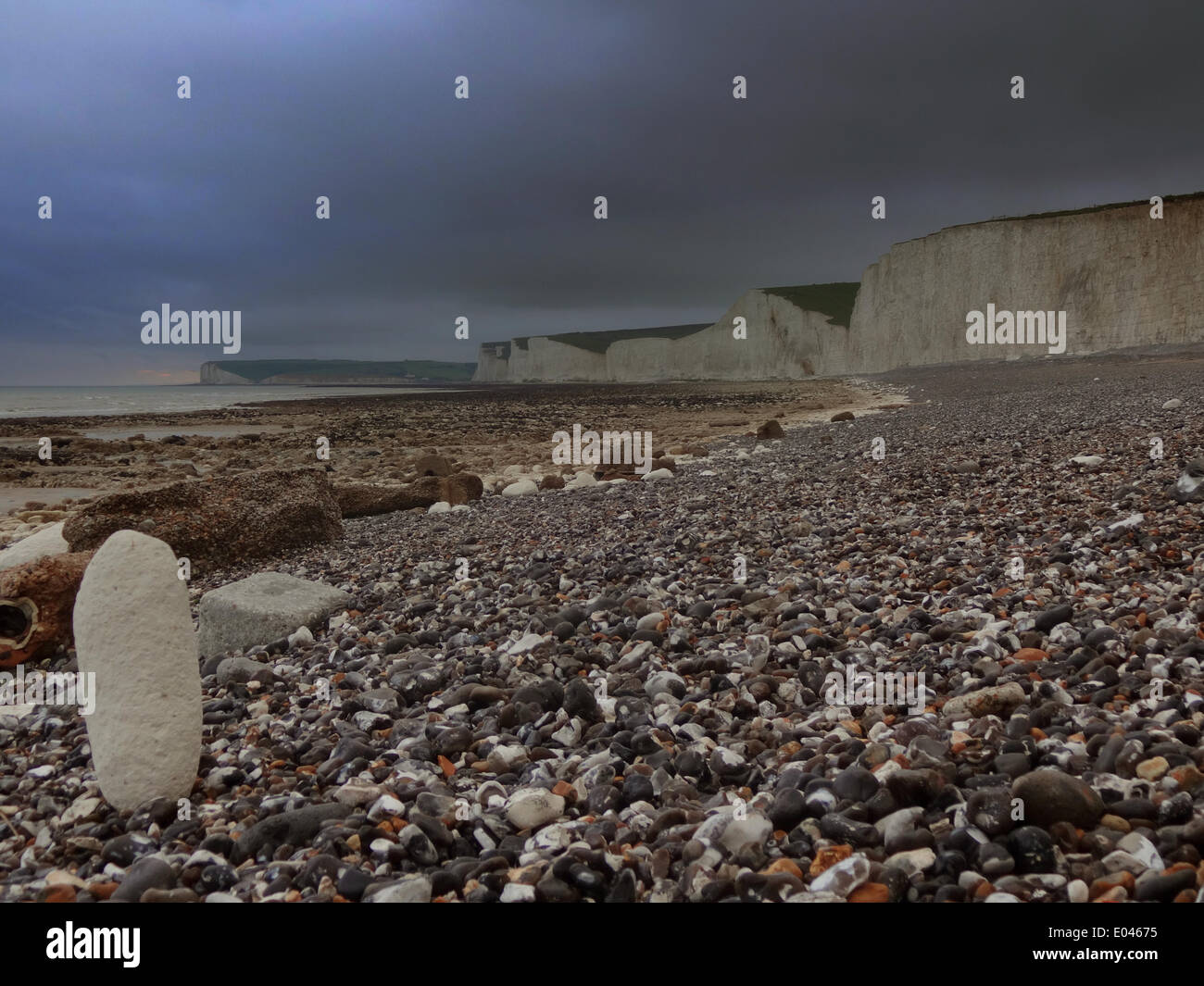 Birling Gap, East Sussex, UK.1 May 2014.Grey clouds and heavy rain showers over the Sussex Coast at sunset. Stock Photo