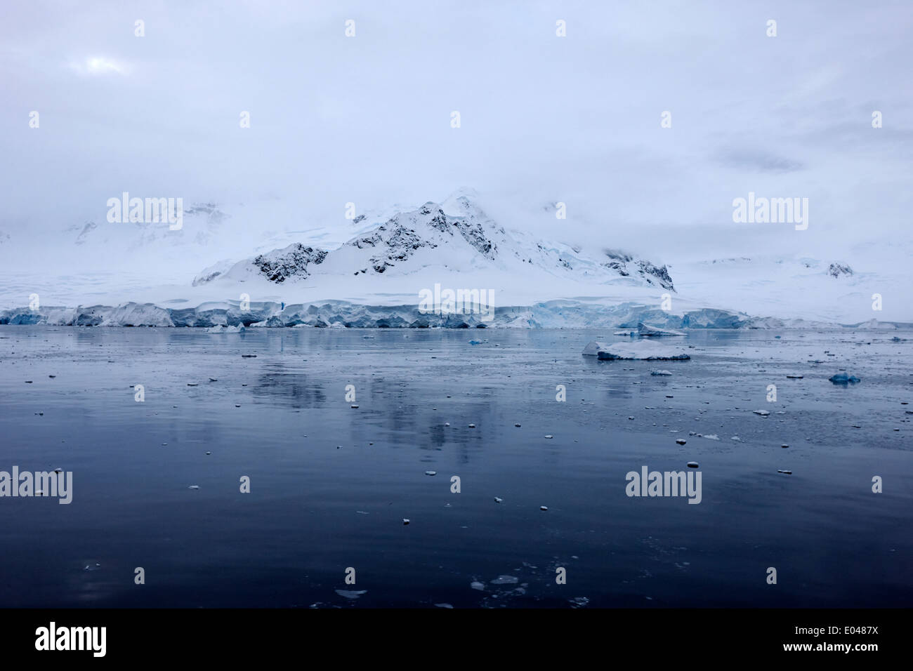 snow covered landscape in Fournier Bay on Anvers Island Antarctica Stock Photo