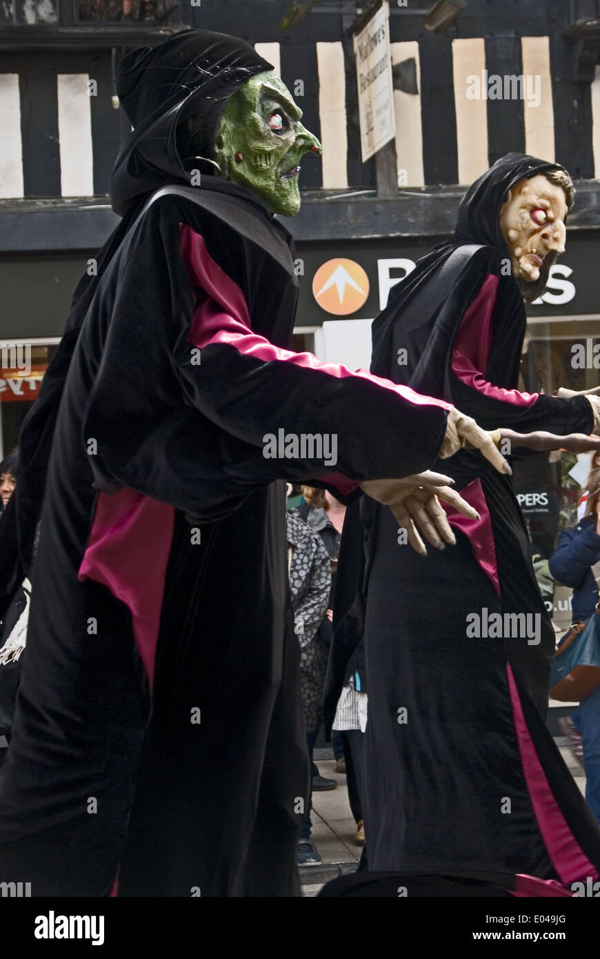 Costumed people as the witches from Macbeth, during William Shakespeare birthday celebrations. Stock Photo