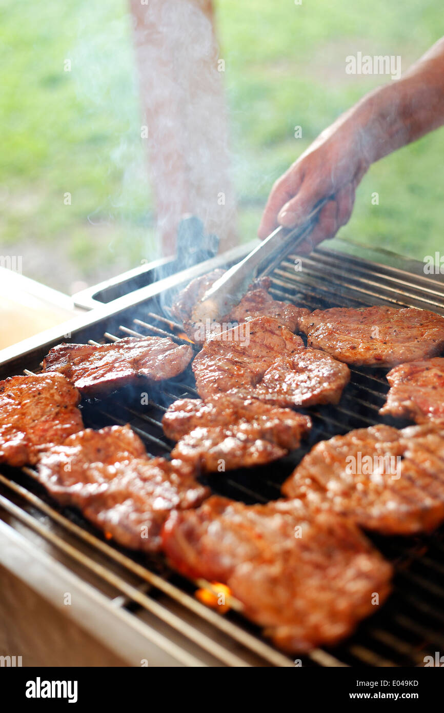 Grill meat at a barbeque Stock Photo