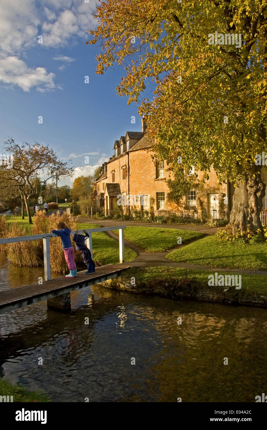 Cotswold village of Lower Slaughter with the River Eye, Gloucestershire. Stock Photo
