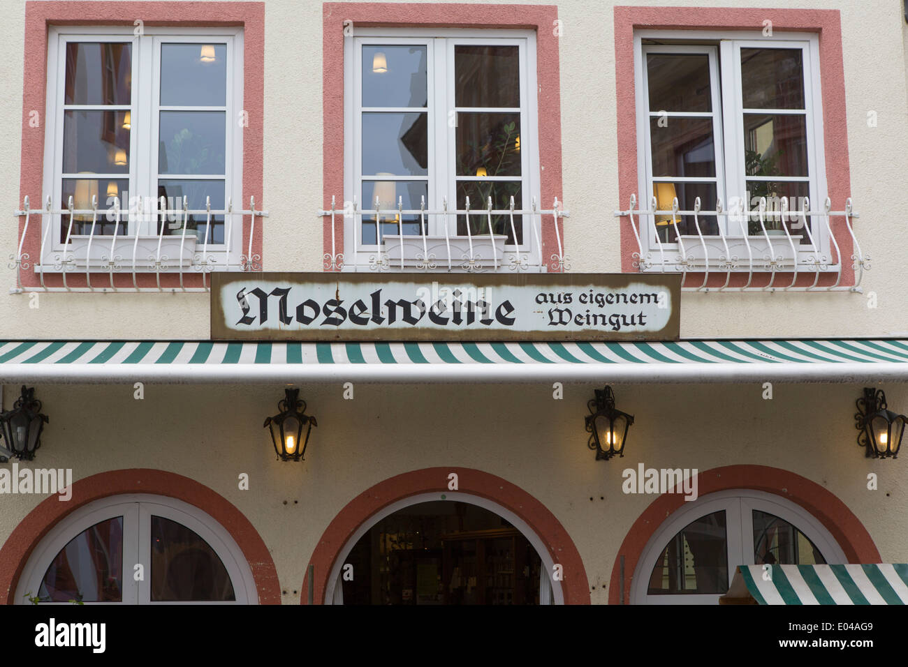 Shop and restaurant with a sign stating that local Mosel wines from their own vineyard are for sale Stock Photo