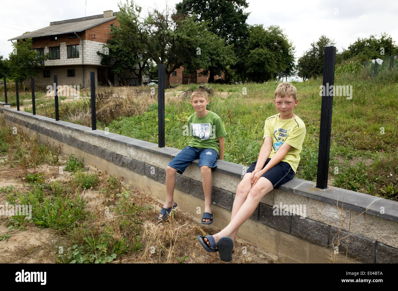 Polish boys age 10 and 11 providing friendly commentary on bicyclers