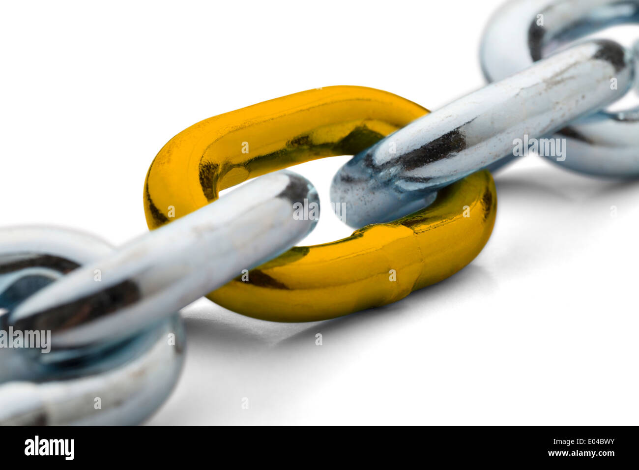 Chain held together with a gold link isolated on a white background