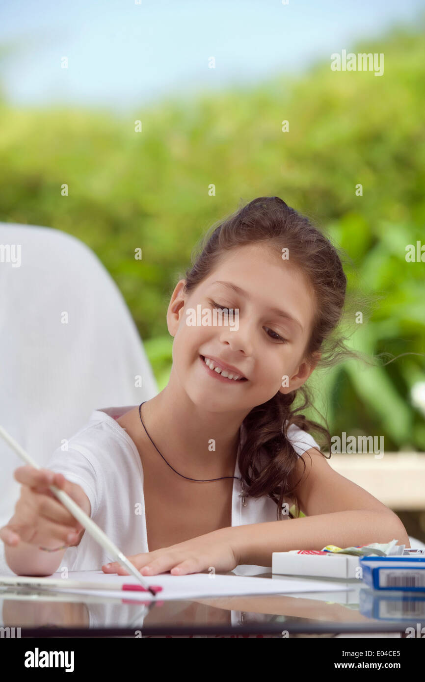 portrait of nice little girl getting busy in summer environment Stock ...