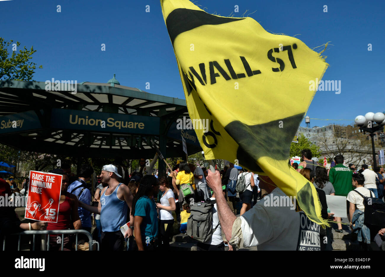 New York, USA. 1st May, 2014. Protestors from Occupy Wall Street and other organizations hold a protest demanding better payment and more immigration rights on May Day in Manhattan, New York, the United States, May 1, 2014. Credit:  Wang Lei/Xinhua/Alamy Live News Stock Photo